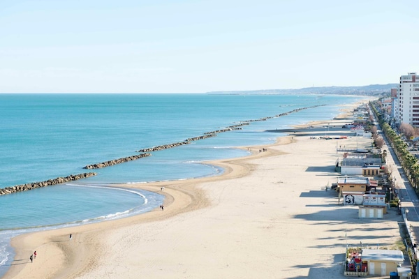Private beach, sun-loungers, beach umbrellas, beach bar