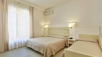 Triple Room | Frette Italian sheets, Select Comfort beds, minibar, in-room safe