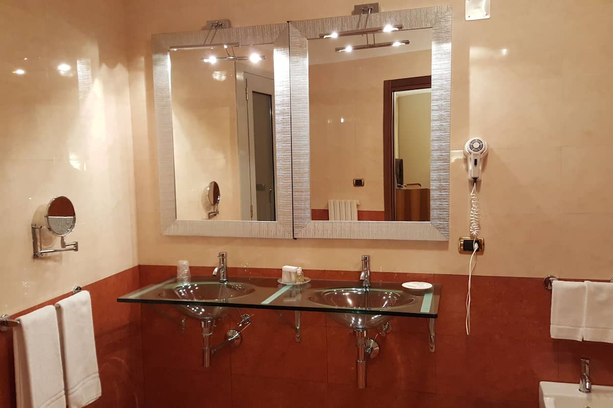 shower, eco-friendly toiletries, hair dryer, bathrobes