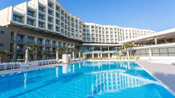 Seasonal outdoor pool, pool umbrellas, pool loungers