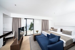 Premium Room, Balcony, Sea View | Minibar, in-room safe, desk, blackout drapes