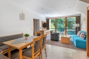 Apartment, 1 Bedroom | Living area | 32-inch flat-screen TV with cable channels, TV