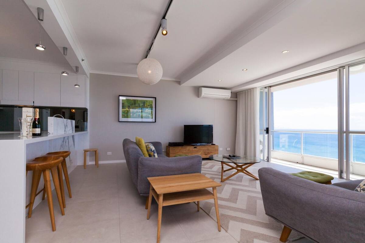 3 Bedroom Deluxe Centre Front | Living area | Flat-screen TV, DVD player
