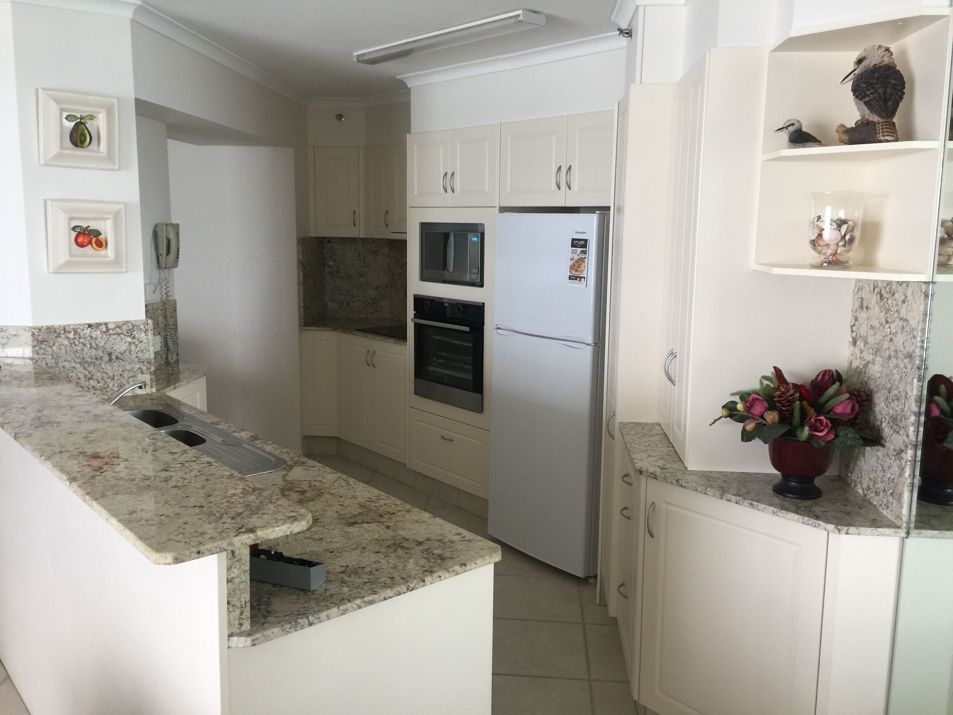 full-sized fridge, microwave, oven, stovetop