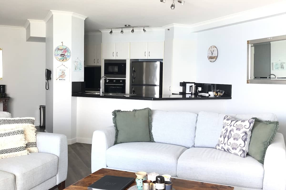 2 bedroom apartment - 2 night stay | living room | 55-inch smart tv with cable channels, tv, dvd player