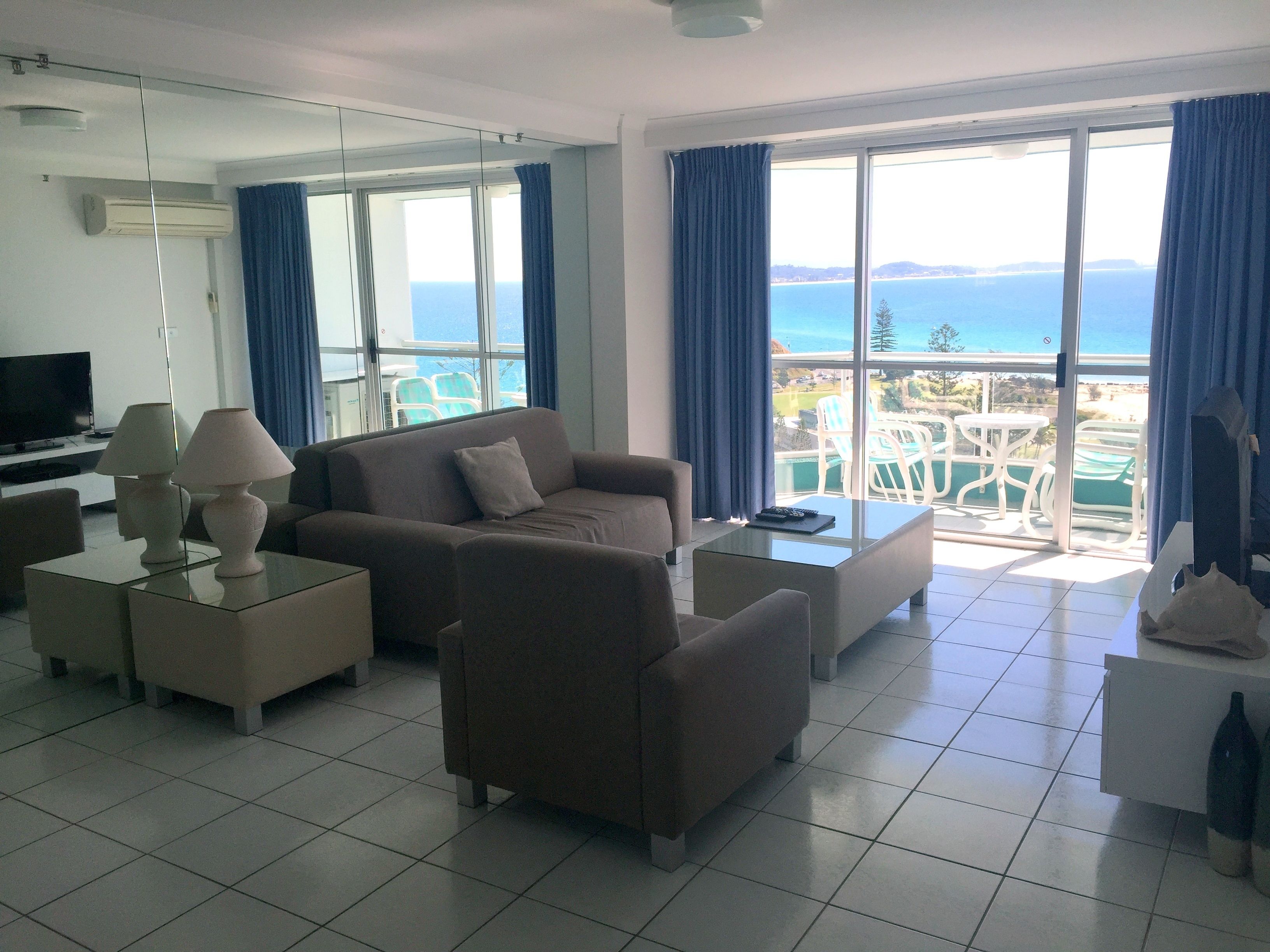 2 bedroom apartment - 5 night stay | living area | 55-inch smart tv with cable channels, tv, dvd player