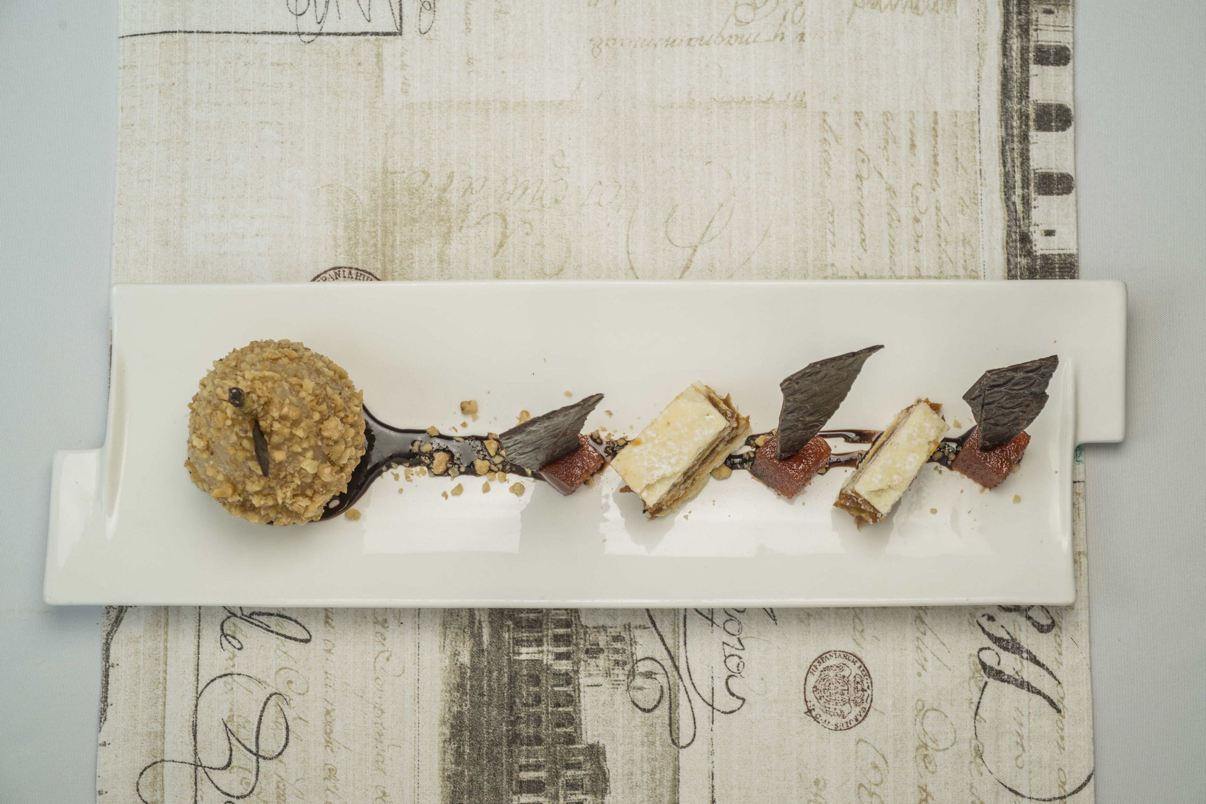 A dessert on a white plate with a vintage background.