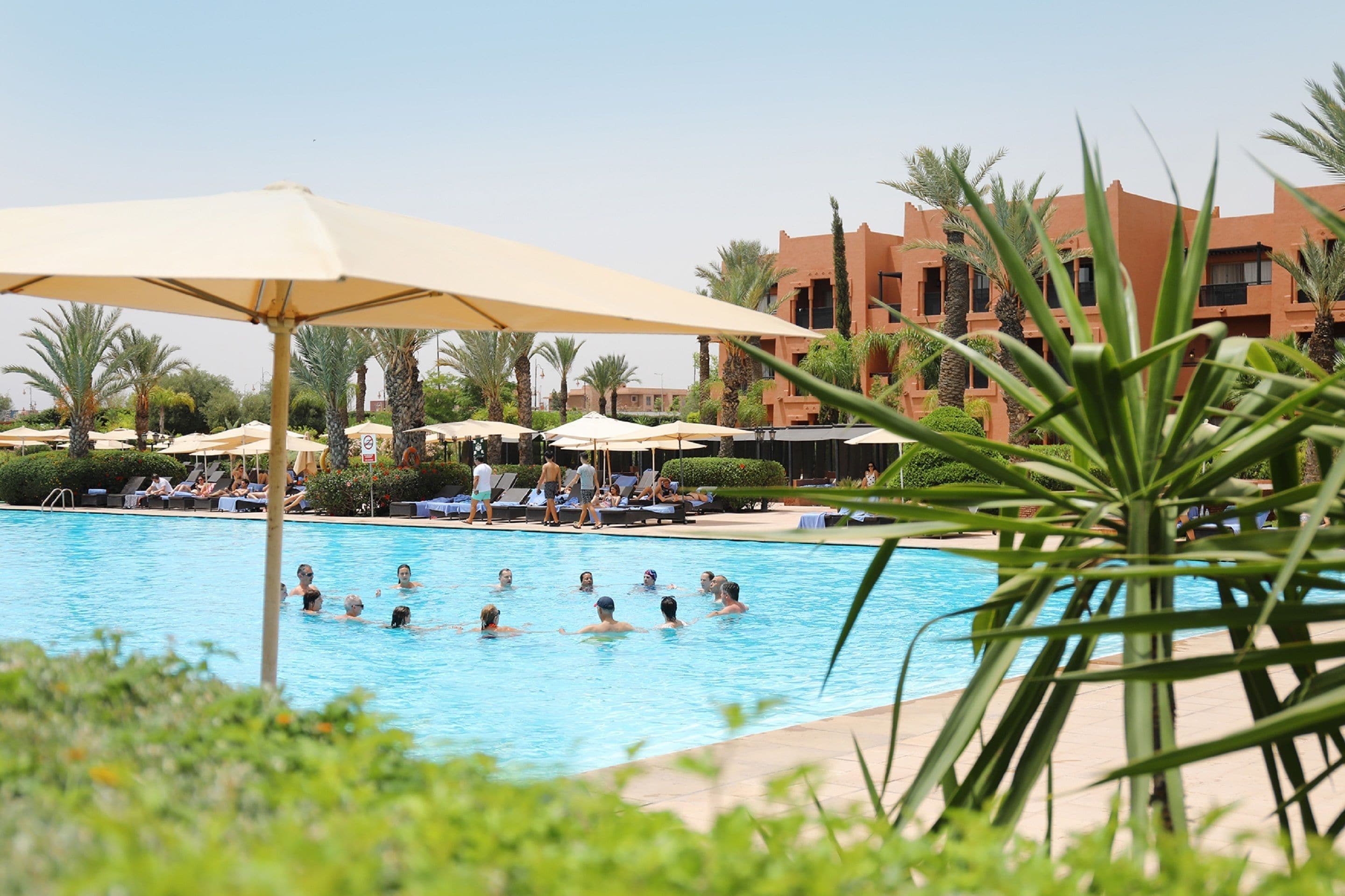 2 outdoor pools, pool umbrellas, pool loungers