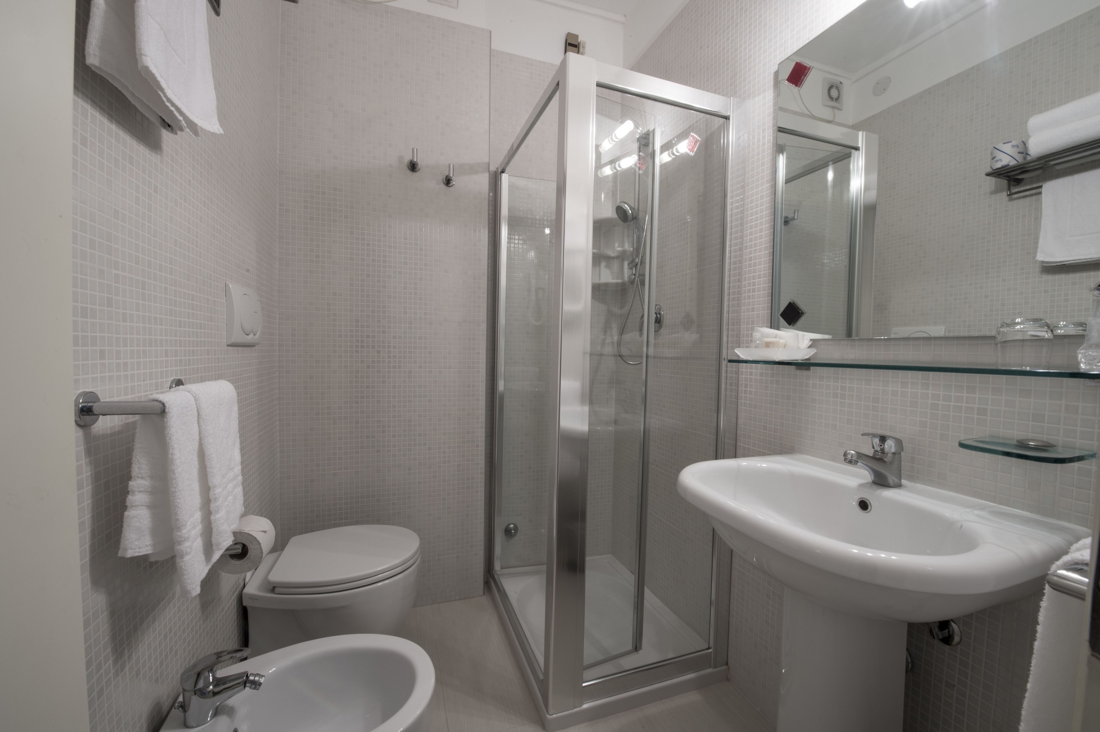 shower, free toiletries, hair dryer, towels