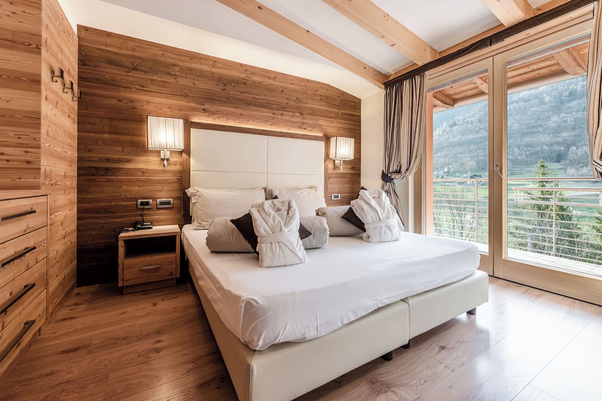 Suite con Balcone train side | Minibar, in-room safe, desk, free WiFi