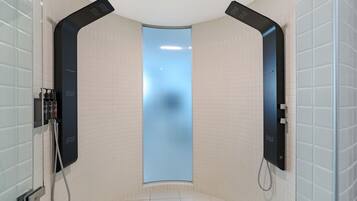 One Bedroom Poolside Villa | Bathroom | Hair dryer, towels, soap, shampoo