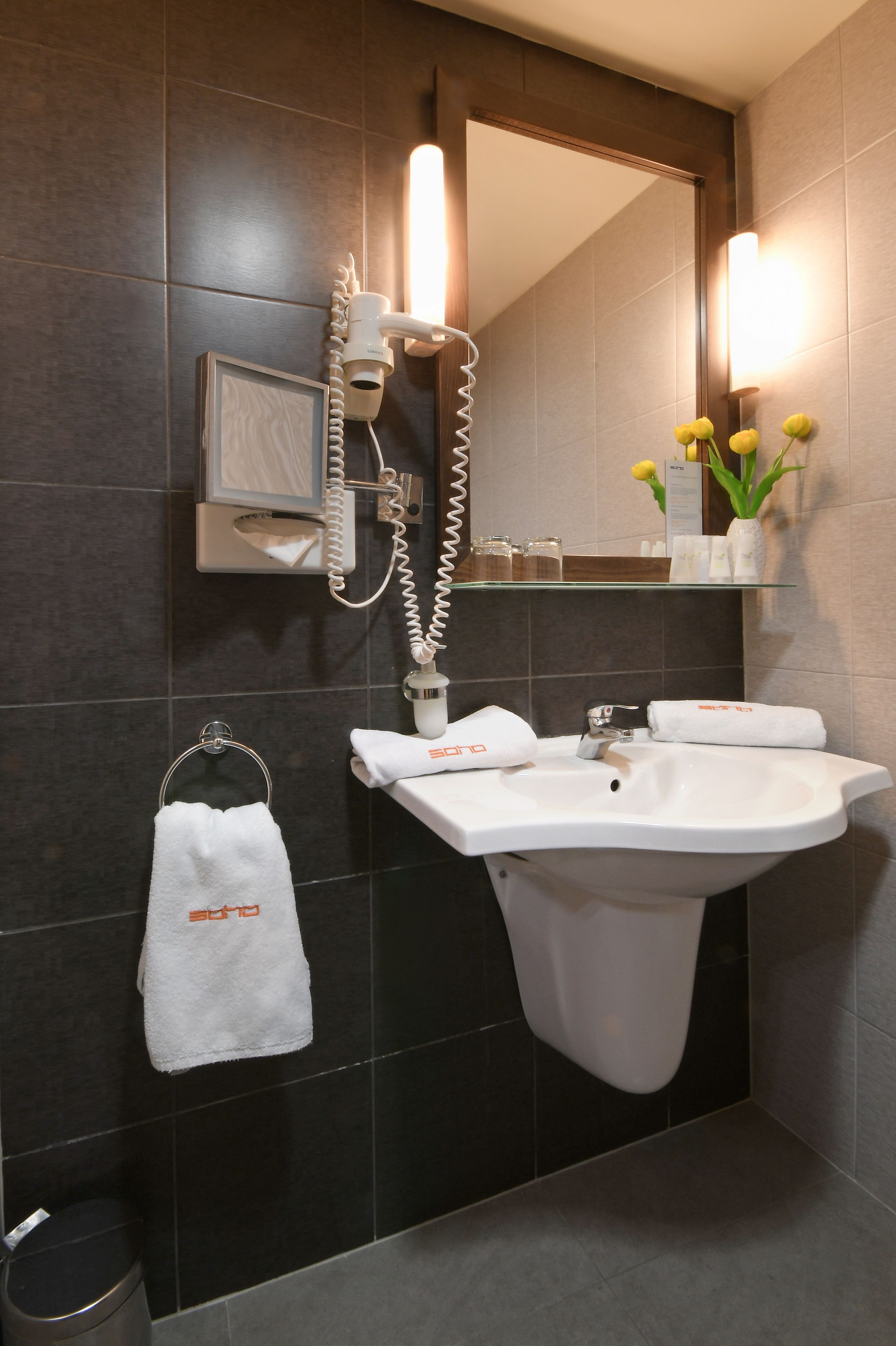suite | bathroom | combined shower/bathtub, hair dryer, slippers, towels