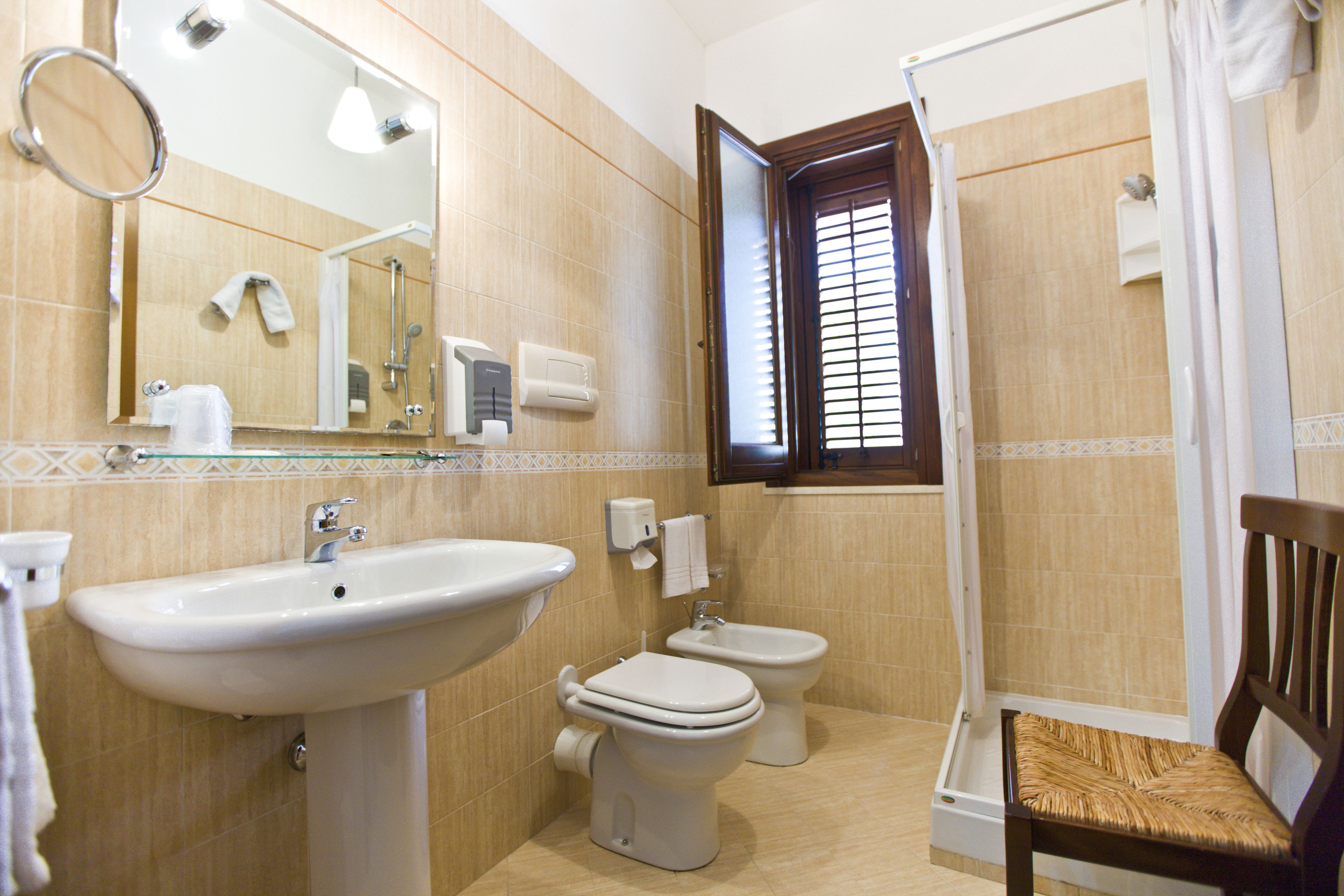 economy double room | bathroom | shower, free toiletries, hair dryer, slippers