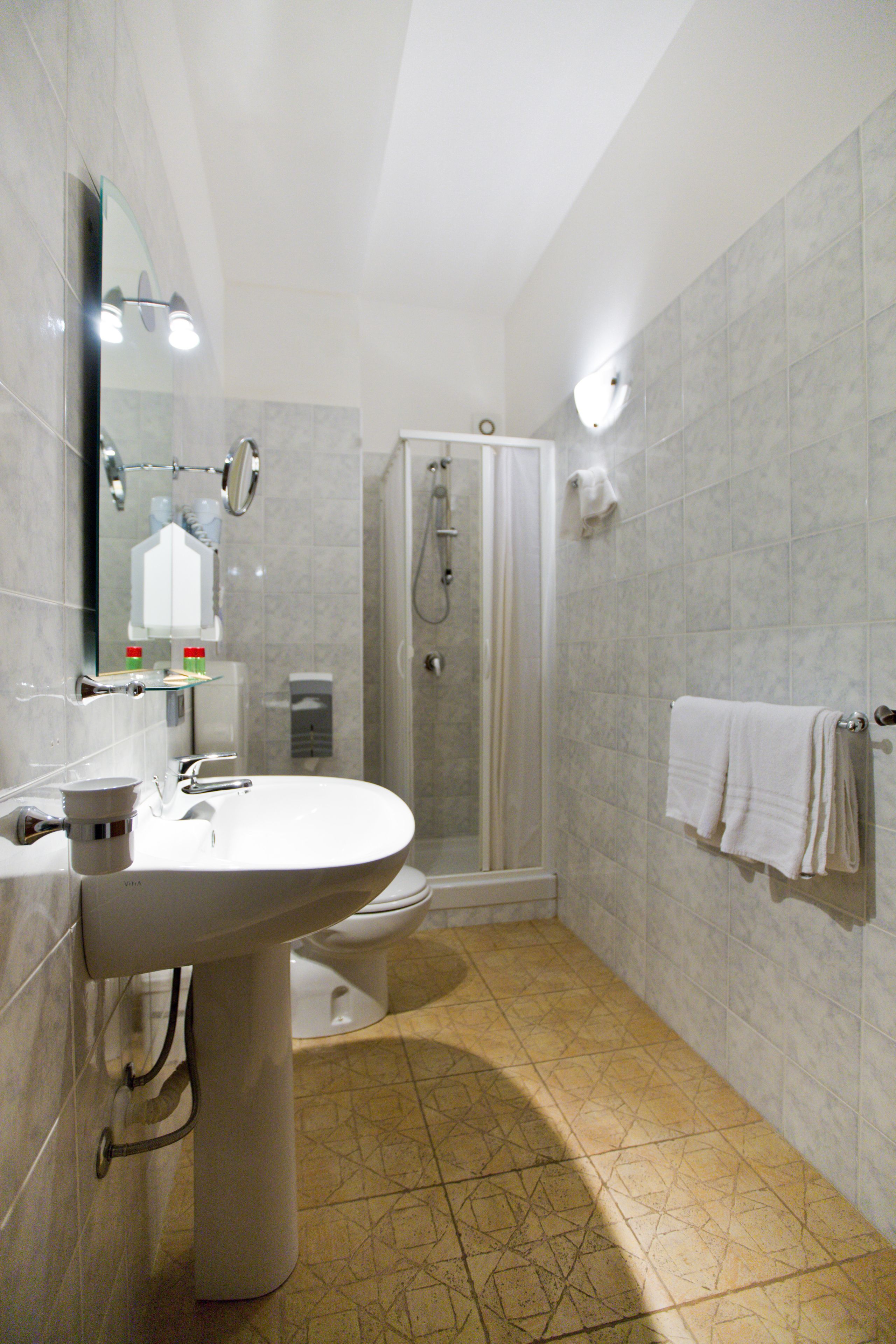 double or twin room | bathroom | shower, free toiletries, hair dryer, slippers