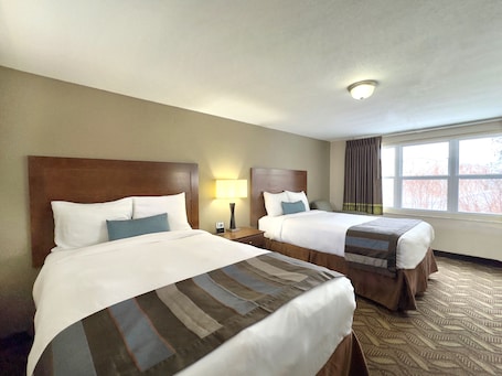 Desk, laptop workspace, blackout drapes, iron/ironing board