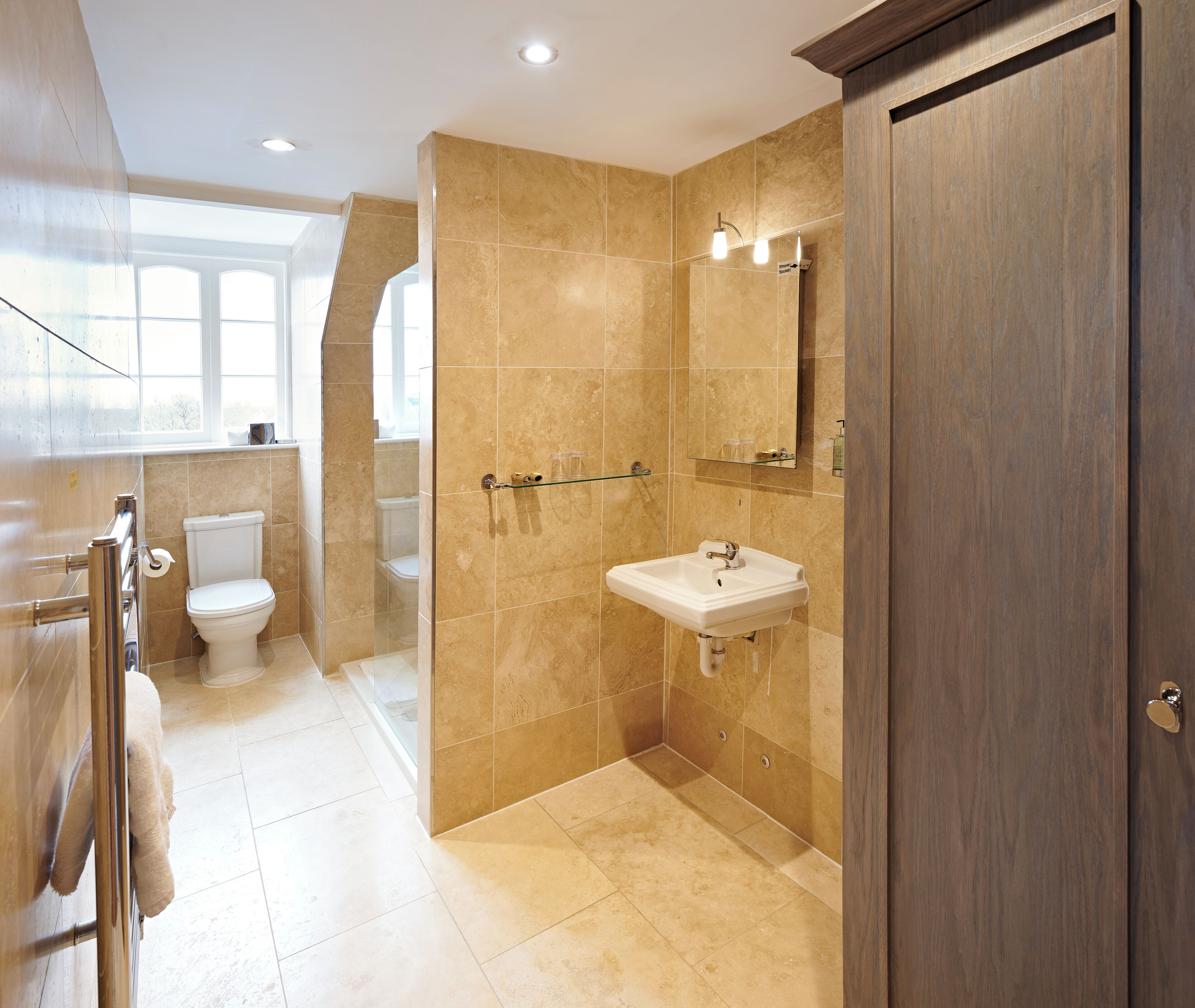 standard king (cozy king) | bathroom | designer toiletries, hair dryer, towels, shampoo