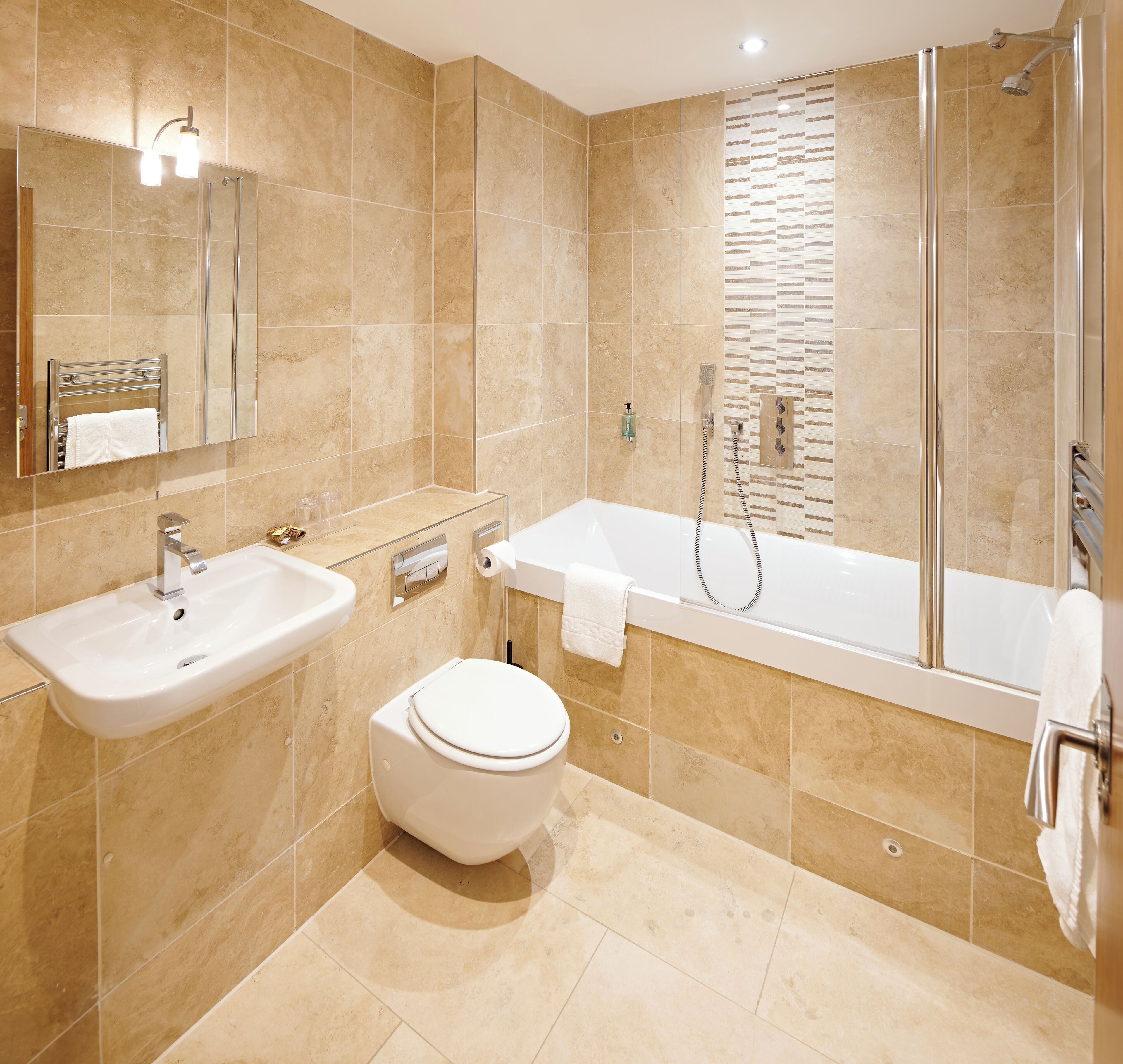 superior room | bathroom | designer toiletries, hair dryer, towels, shampoo