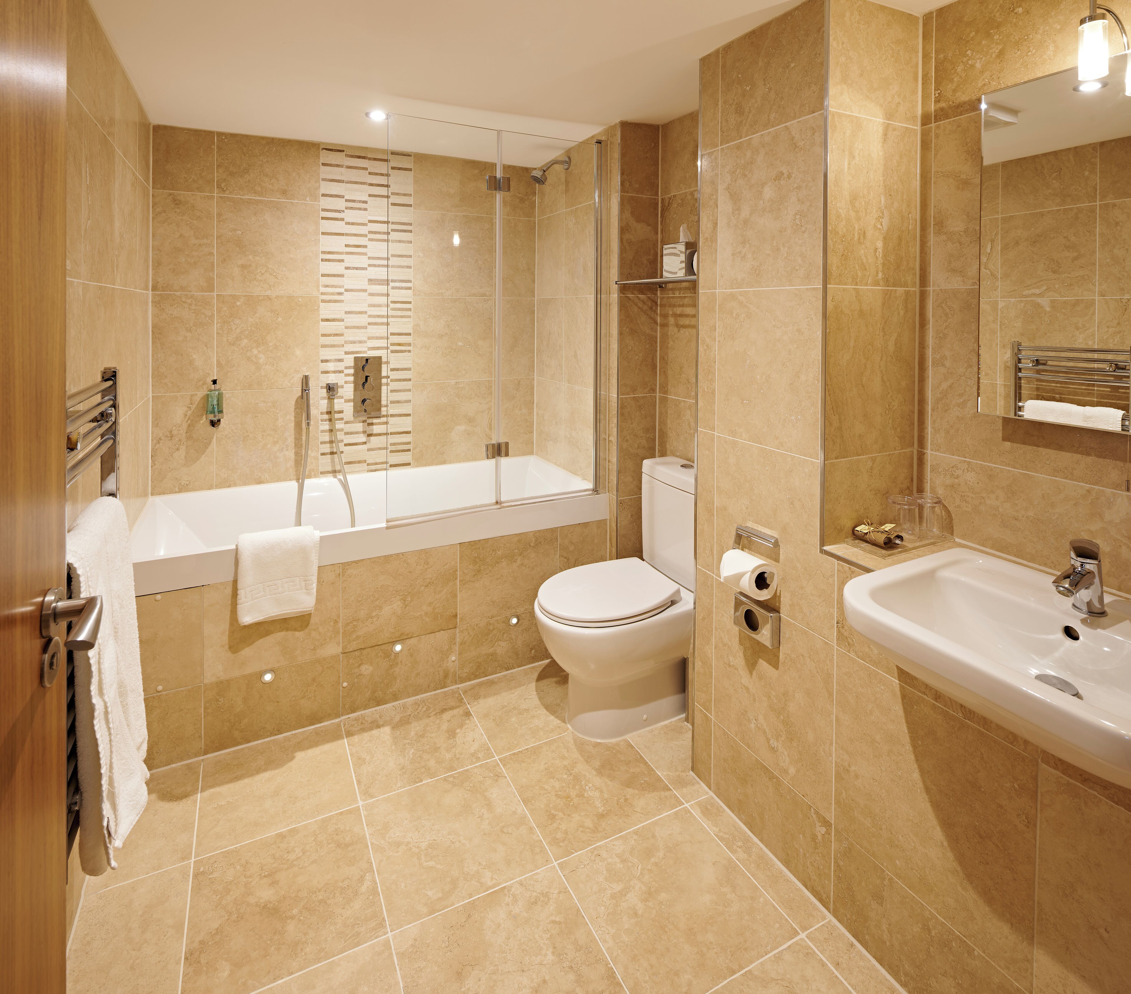 classic twin | bathroom | designer toiletries, hair dryer, towels, shampoo