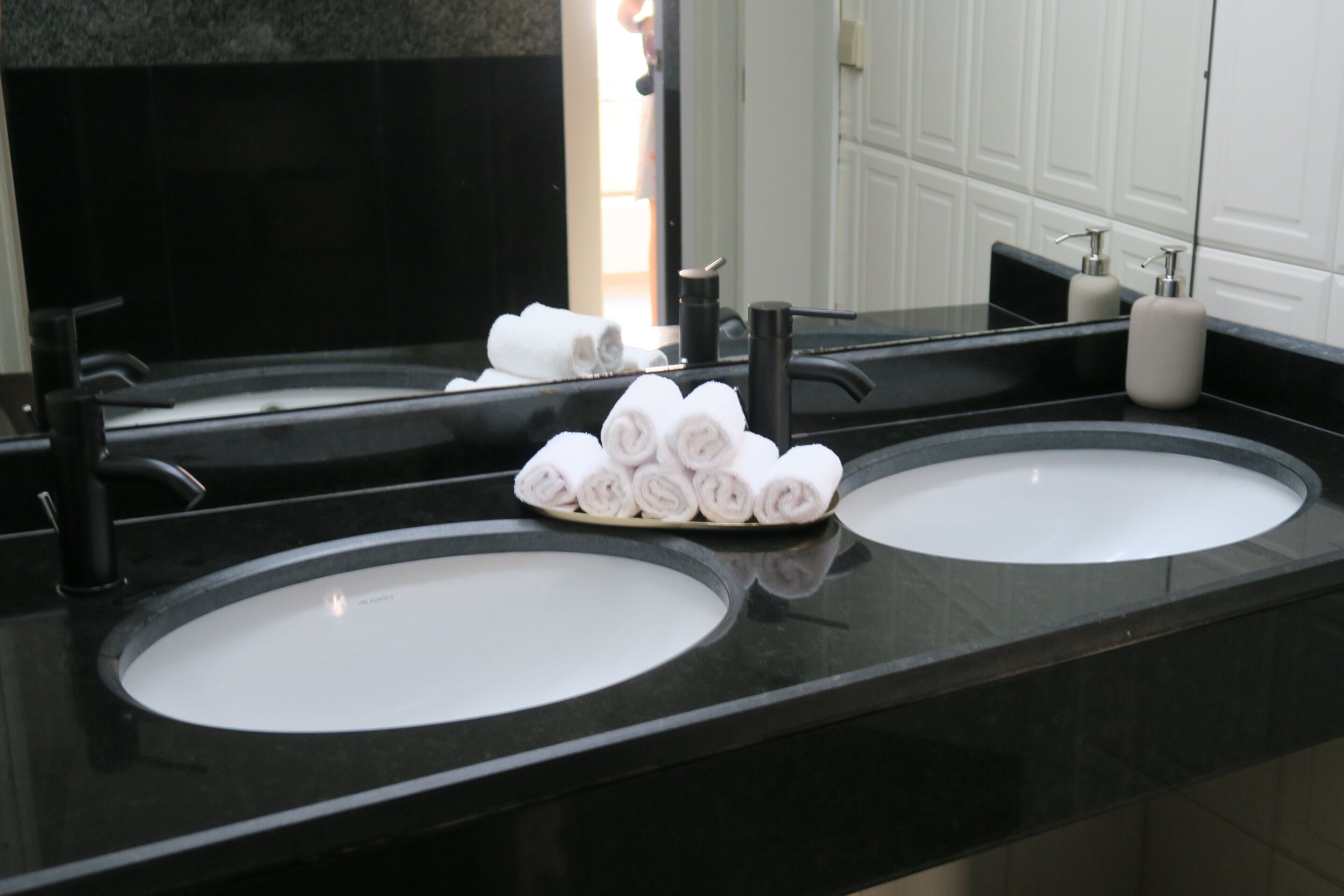 combined shower/bathtub, rainfall showerhead, hair dryer, bidet