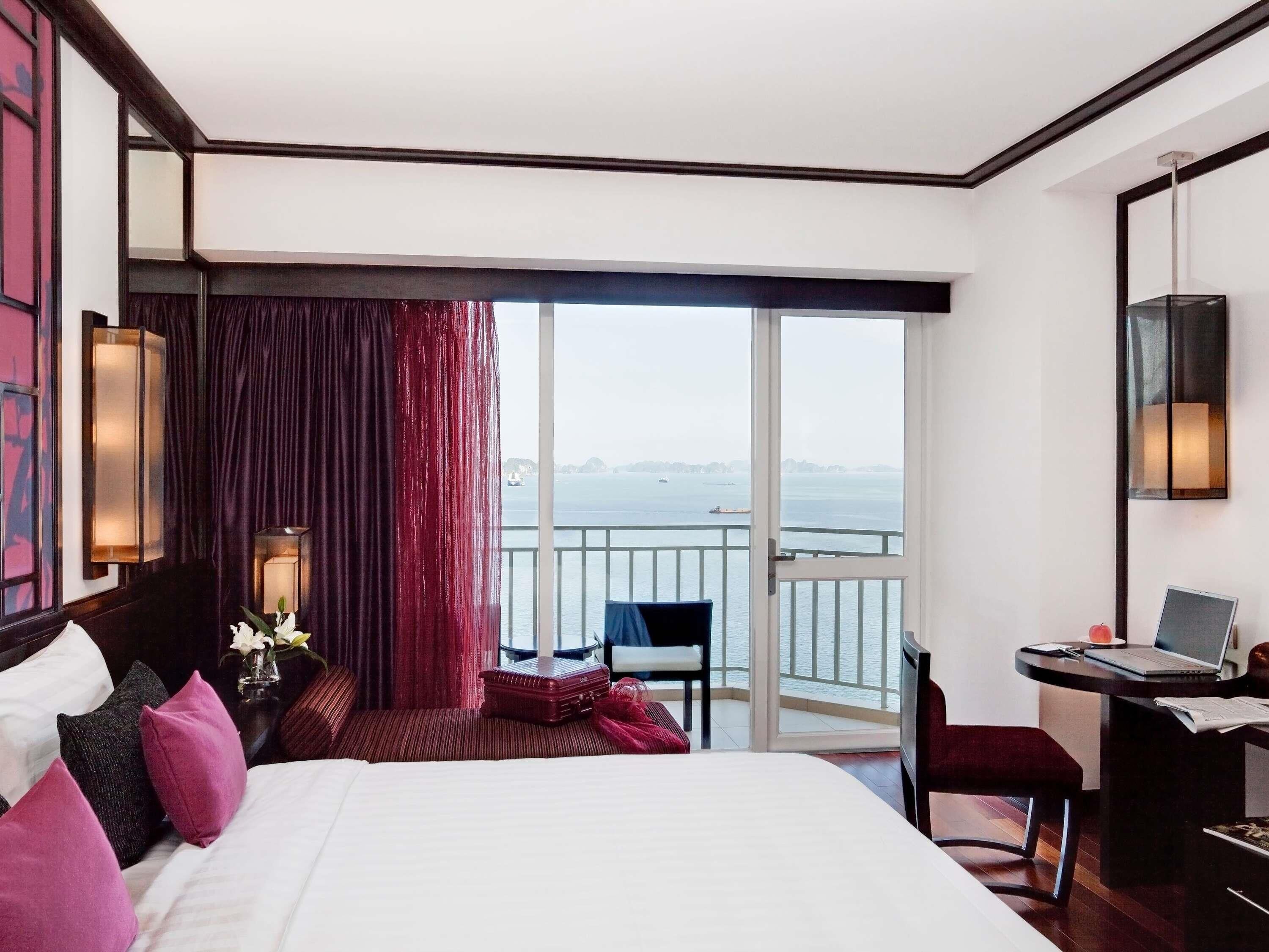 Deluxe Room, 1 King Bed, Bay View | Minibar, in-room safe, desk, laptop workspace