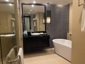 Rainfall showerhead, eco-friendly toiletries, hair dryer, bathrobes