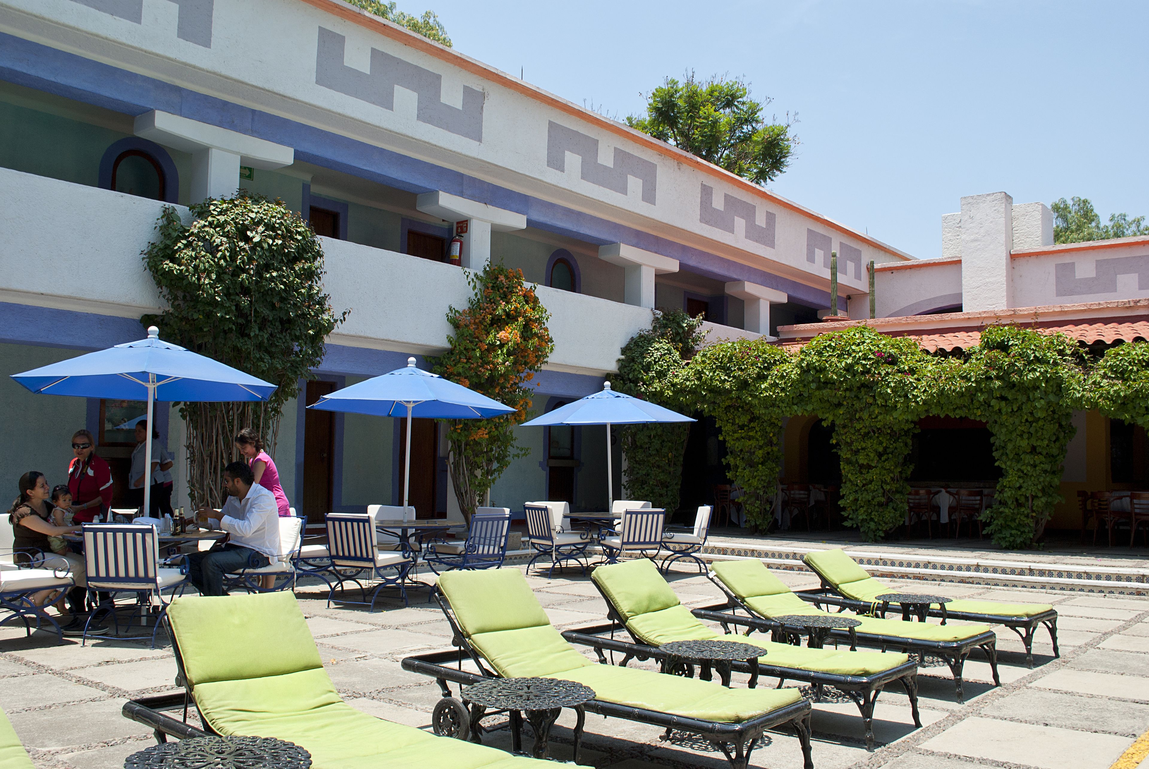 outdoor pool, pool umbrellas, pool loungers