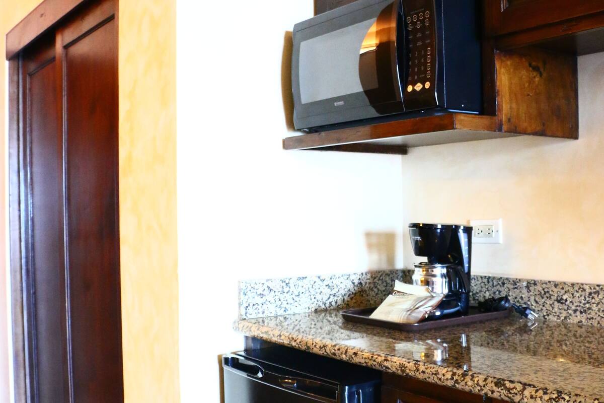 luxury room, 1 bedroom, ocean view (superior) | private kitchen | coffee/tea maker
