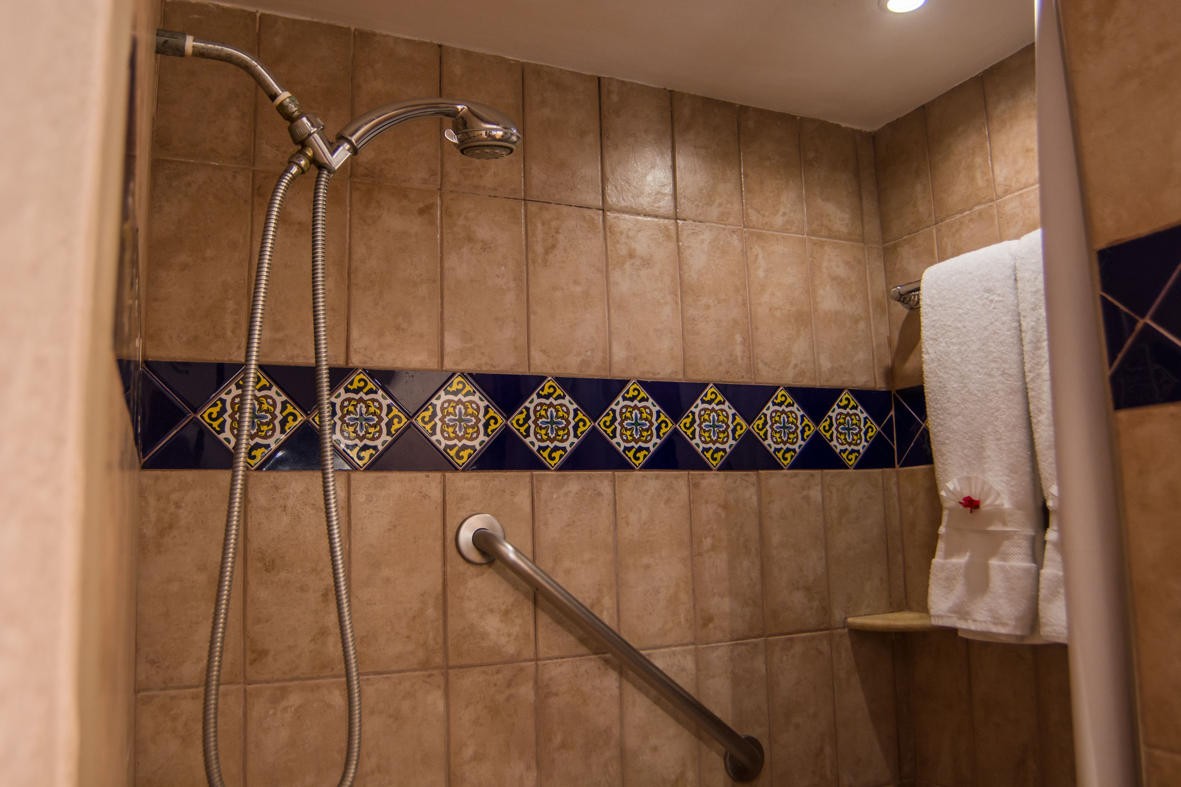 standard room | bathroom | shower, free toiletries, hair dryer, towels