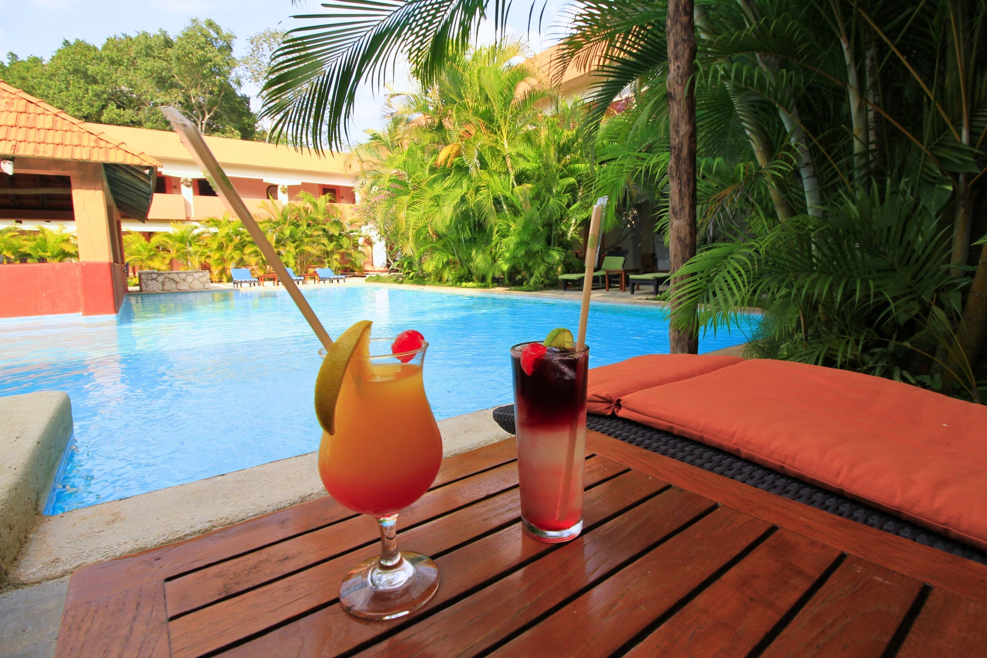 outdoor pool, pool umbrellas, pool loungers