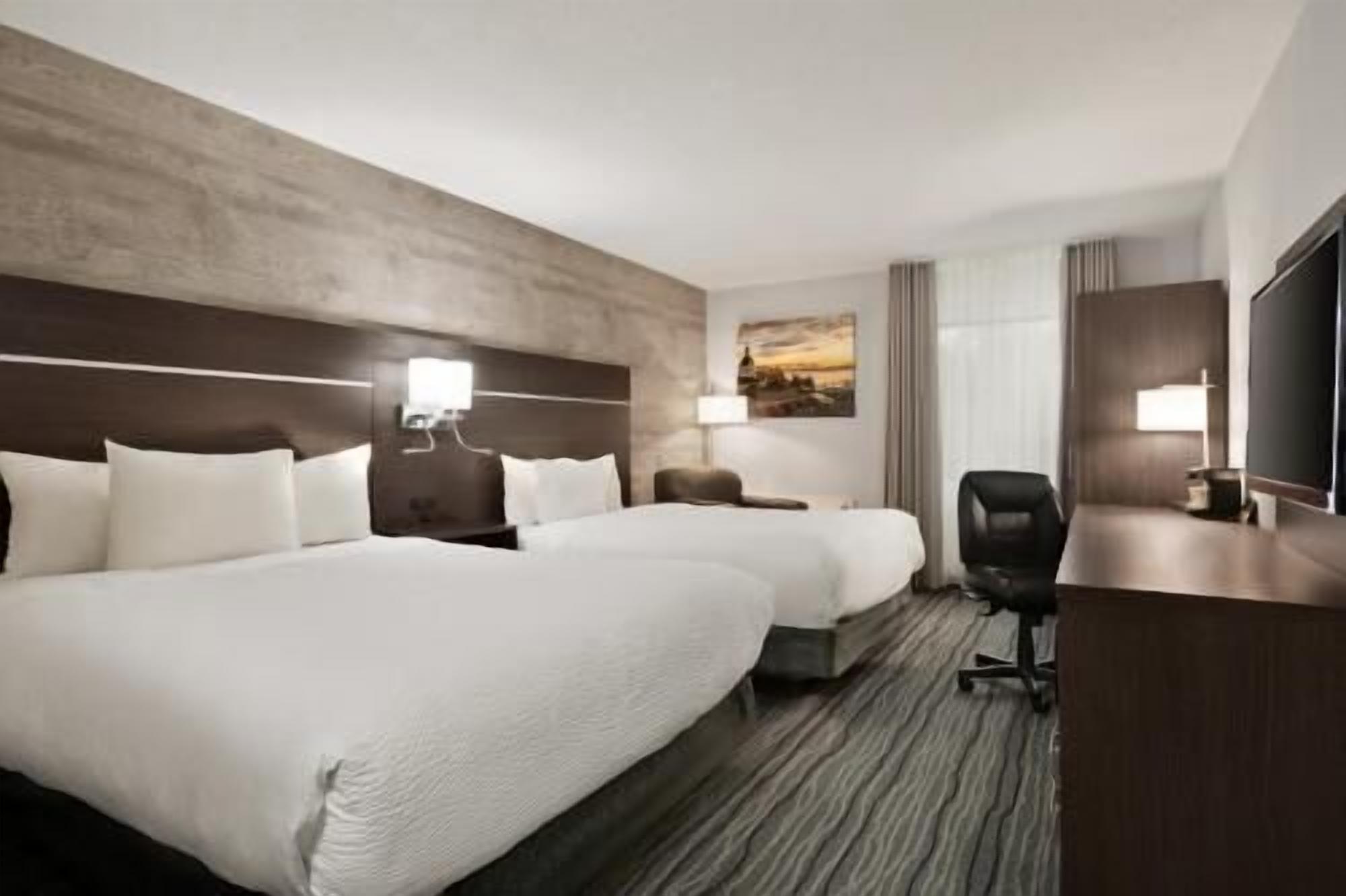 Premium bedding, pillow-top beds, in-room safe, desk