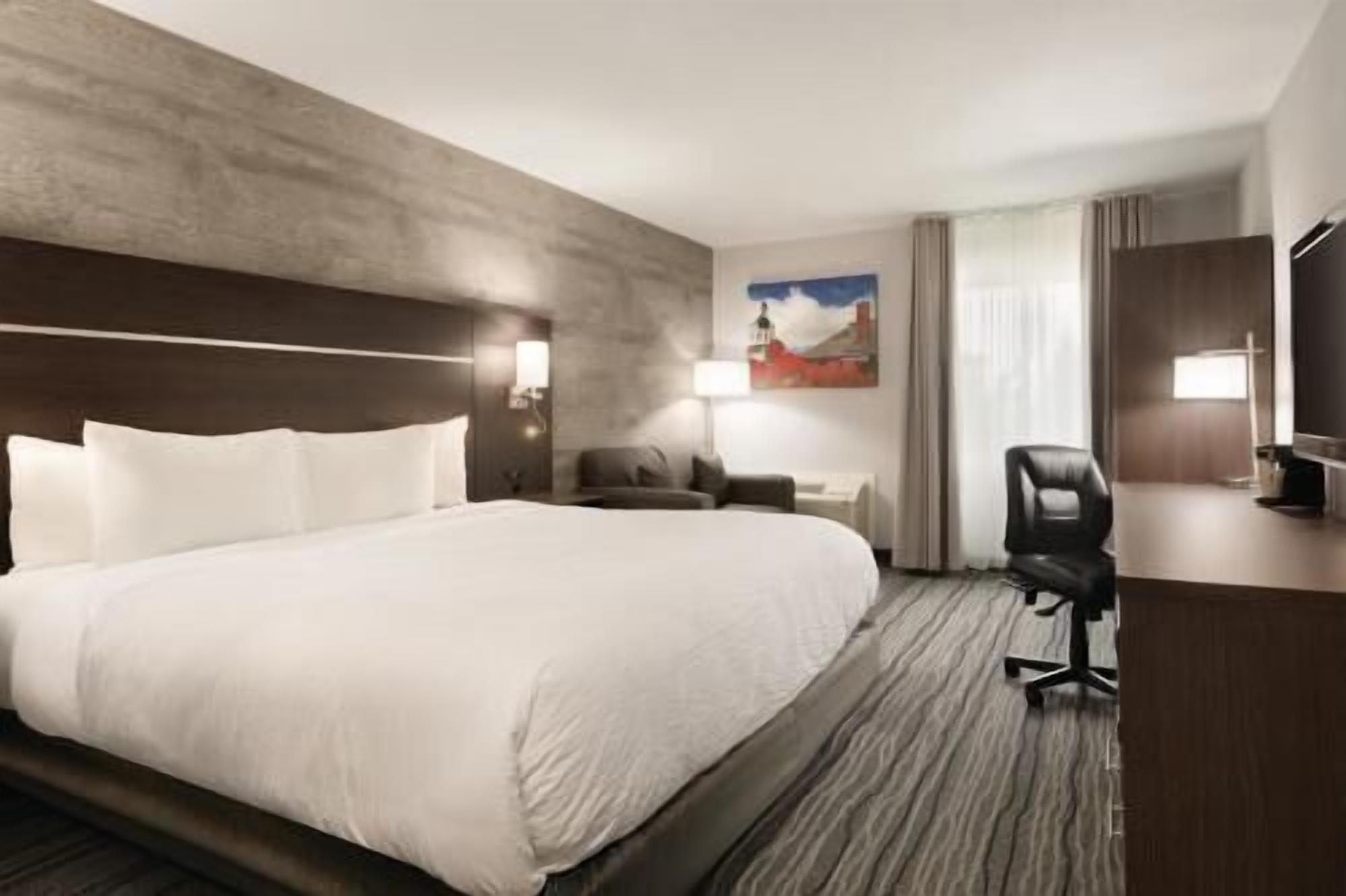 Premium bedding, pillow-top beds, in-room safe, desk