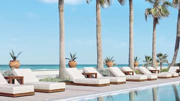Indoor pool, seasonal outdoor pool, pool umbrellas, sun loungers