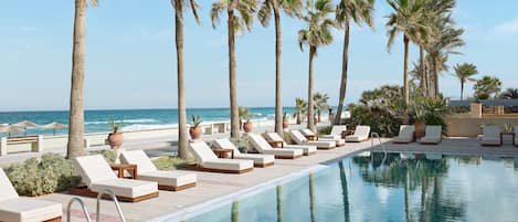 Indoor pool, seasonal outdoor pool, pool umbrellas, sun loungers