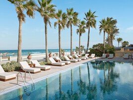 Indoor pool, seasonal outdoor pool, pool umbrellas, pool loungers