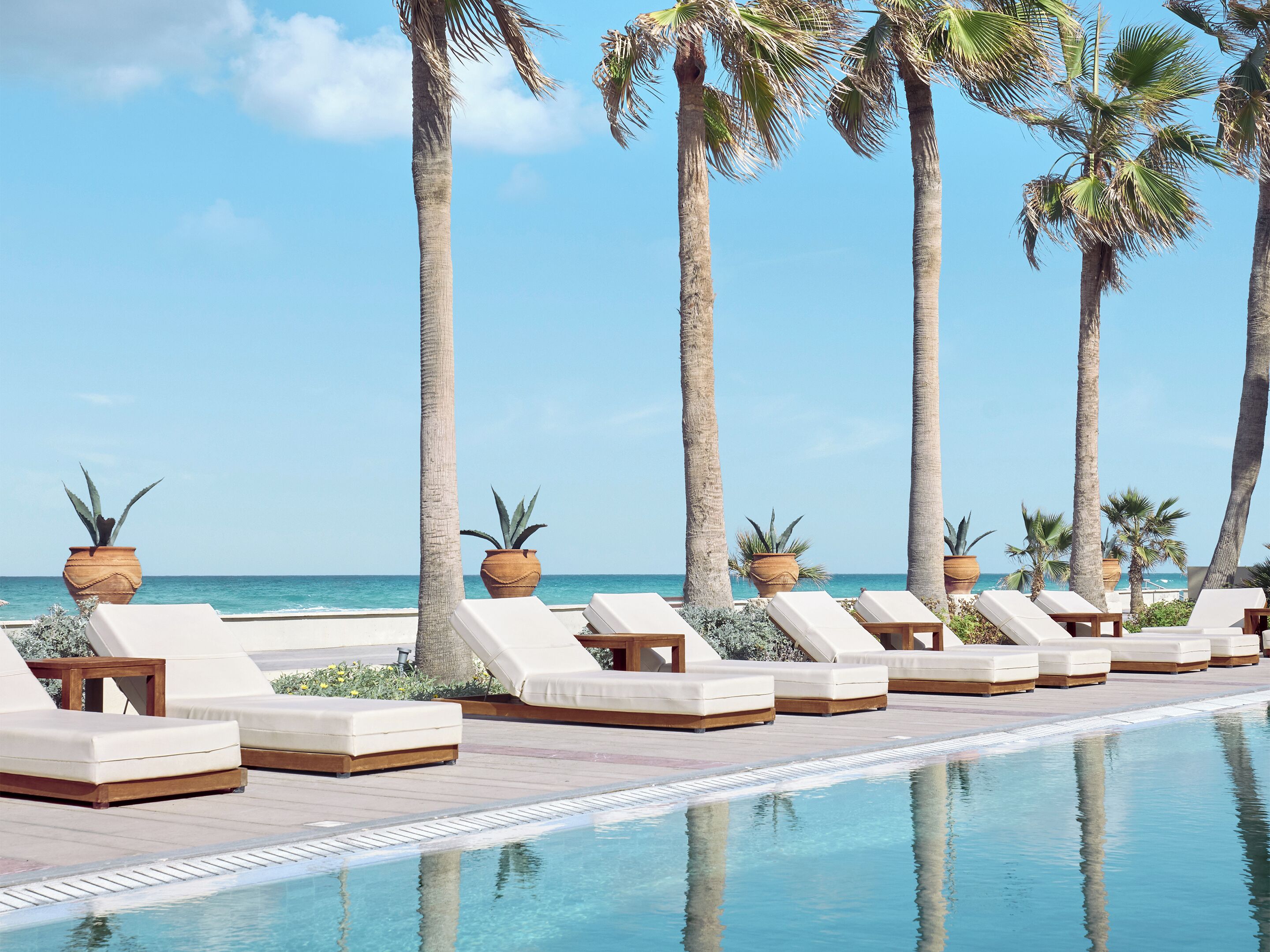 Indoor pool, seasonal outdoor pool, pool umbrellas, sun loungers