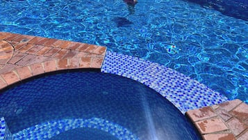 Outdoor pool, open 7:00 AM to 9:00 PM, pool umbrellas, sun loungers