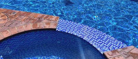 Outdoor pool, open 7:00 AM to 9:00 PM, pool umbrellas, pool loungers