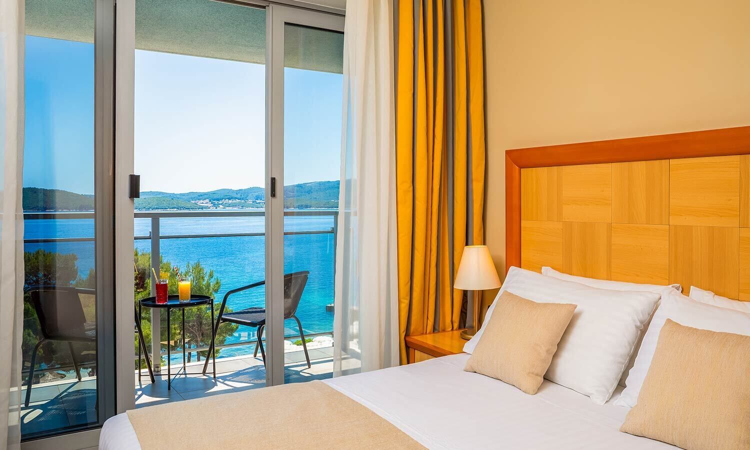 family room with seaside balcony | 1 bedroom, minibar, in-room safe, desk