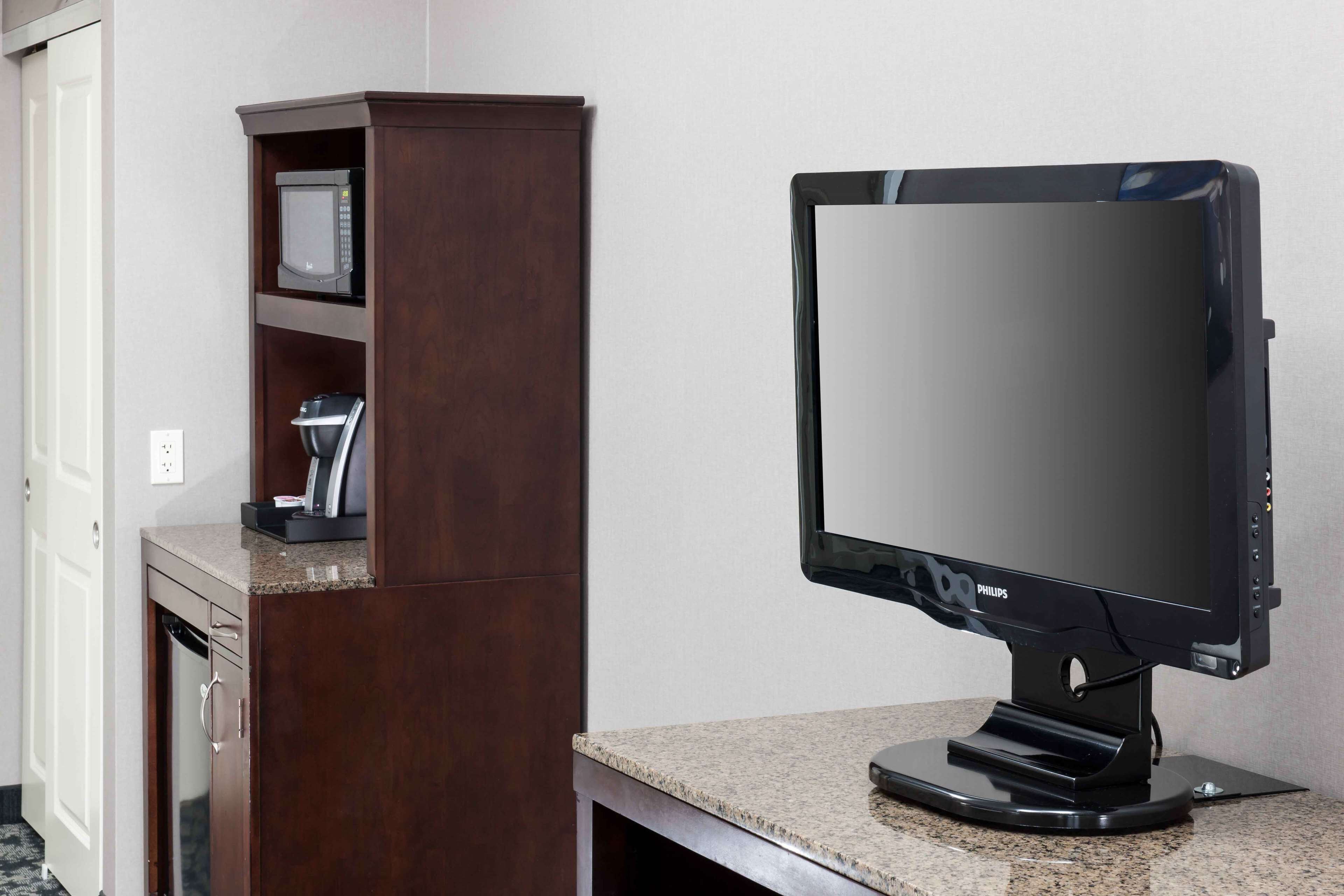 premium bedding, desk, laptop workspace, blackout curtains