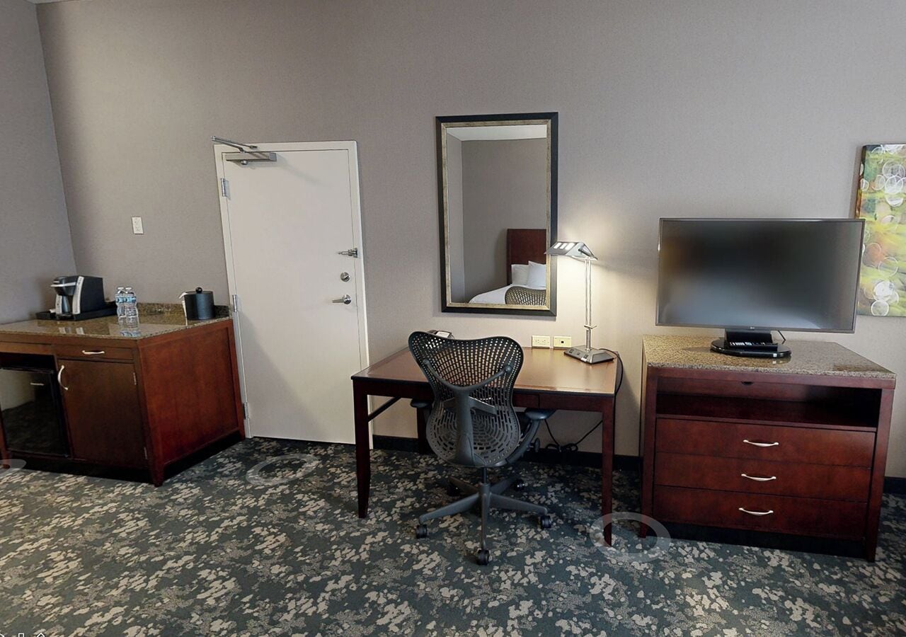 premium bedding, desk, laptop workspace, blackout curtains