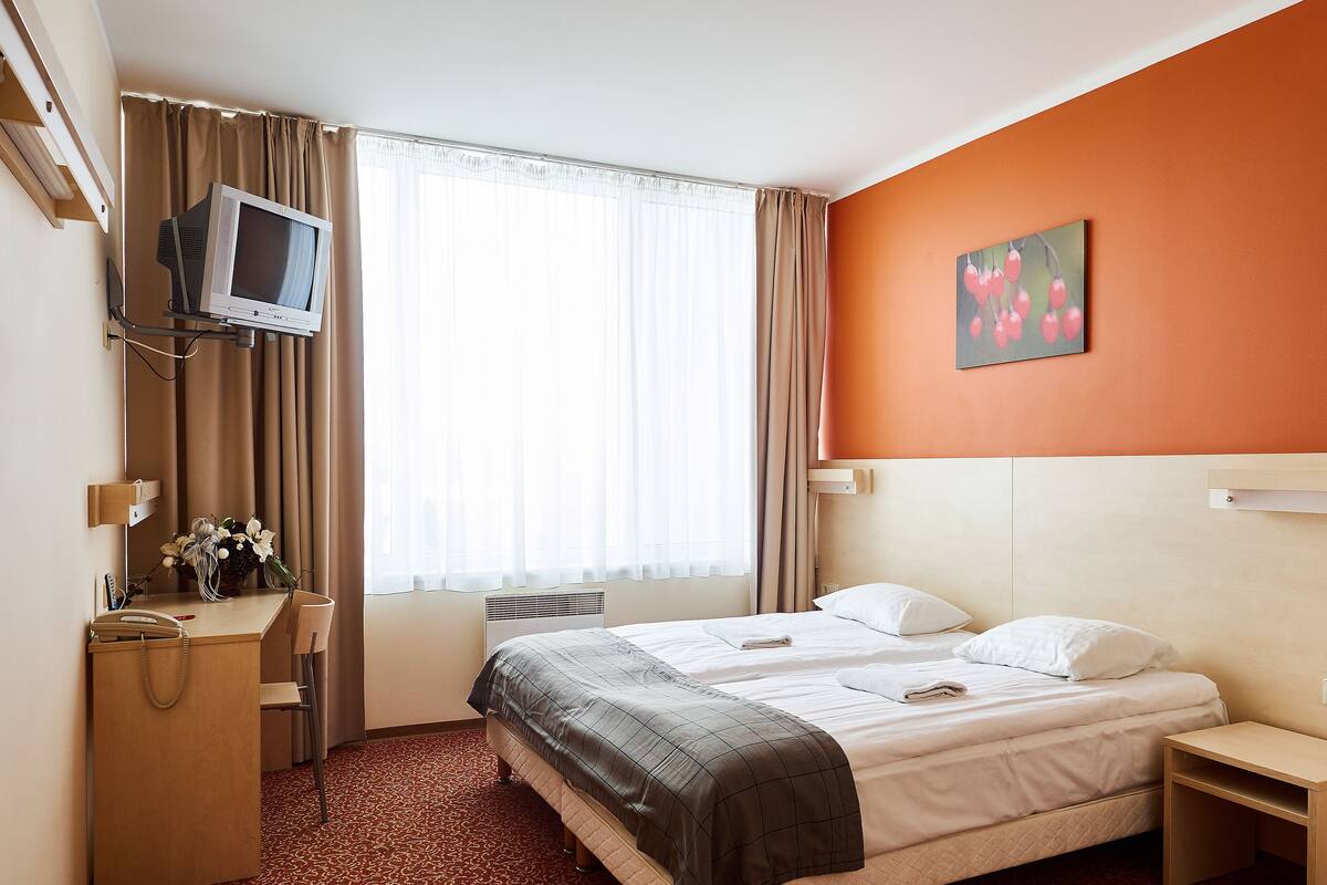 Desk, soundproofing, rollaway beds (surcharge), WiFi (free)