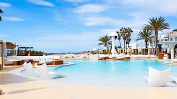 Outdoor pool, pool umbrellas, sun loungers