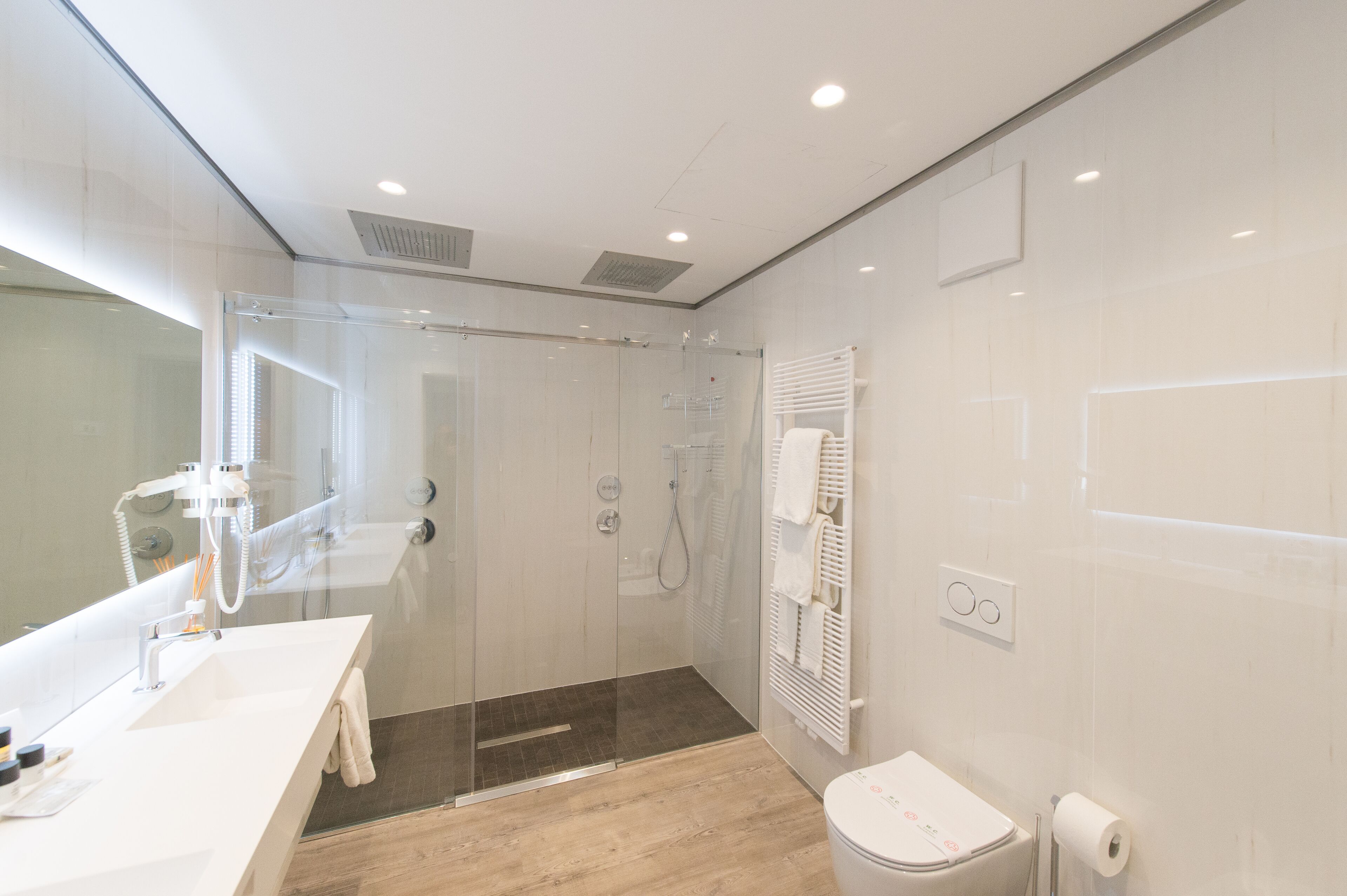 family suite, sauna (spa access included) | bathroom | shower, rainfall showerhead, free toiletries, hair dryer
