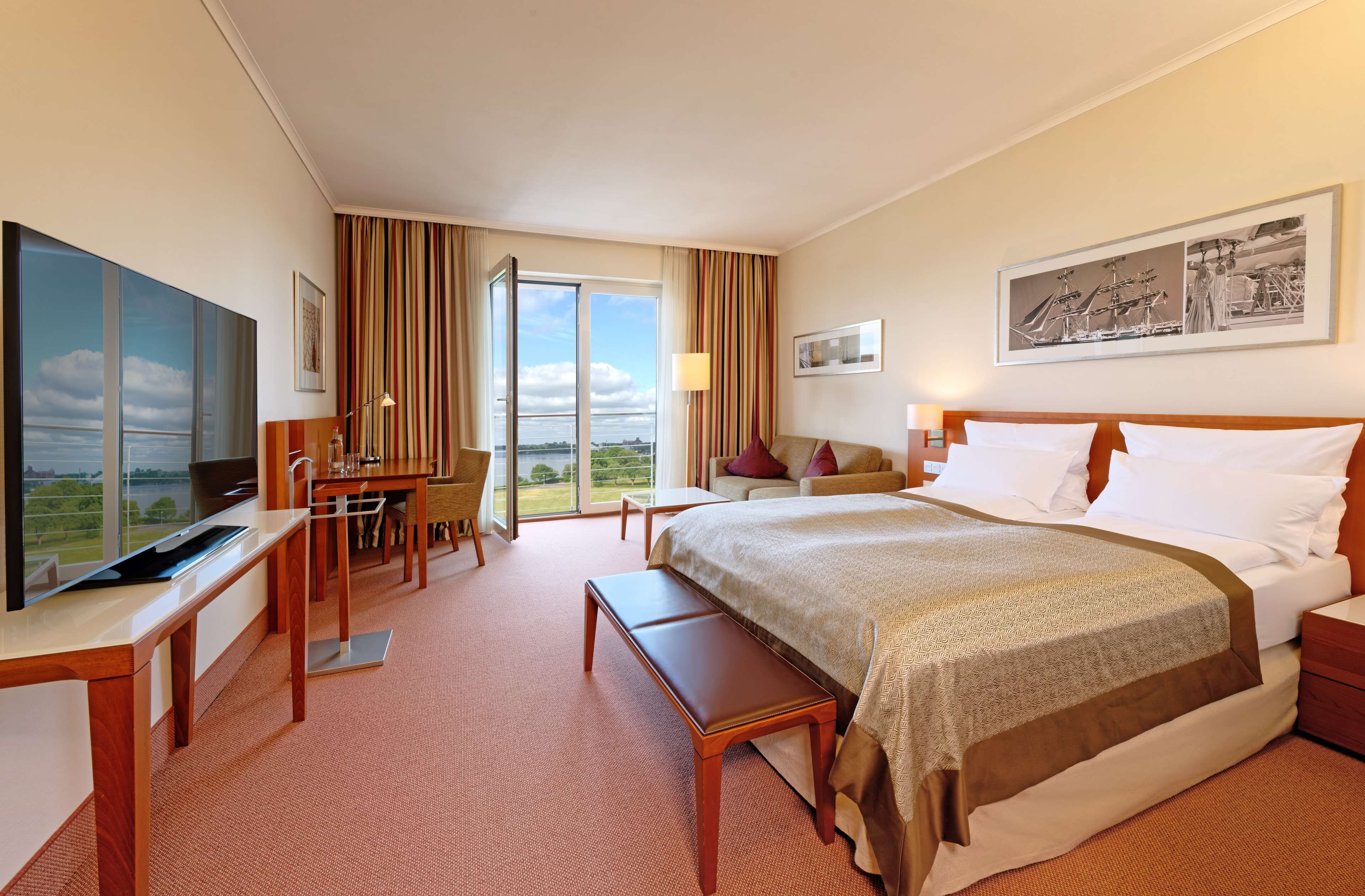 comfort room | premium bedding, in-room safe, individually decorated