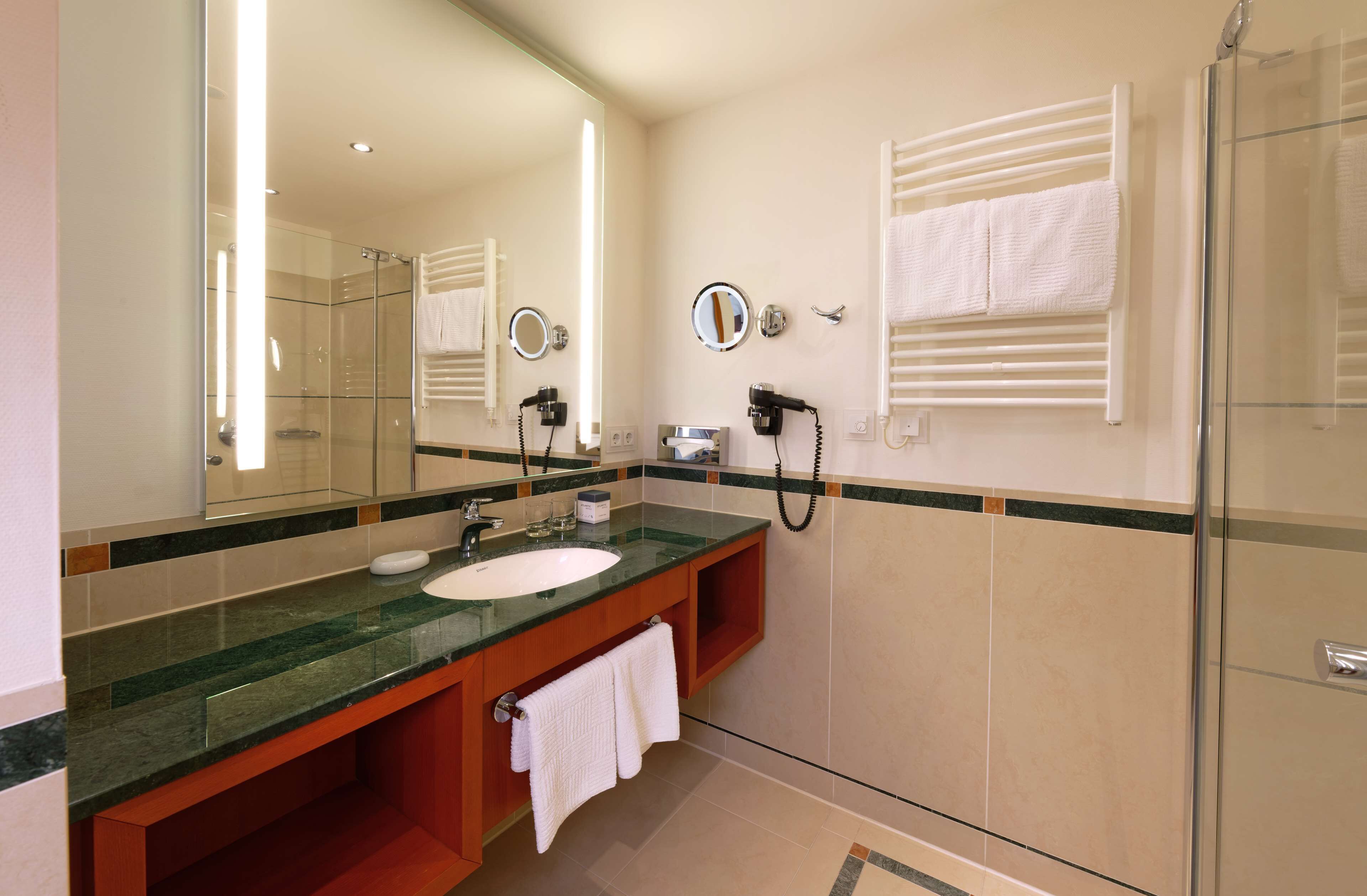 comfort room | bathroom | shower, free toiletries, hair dryer, bathrobes