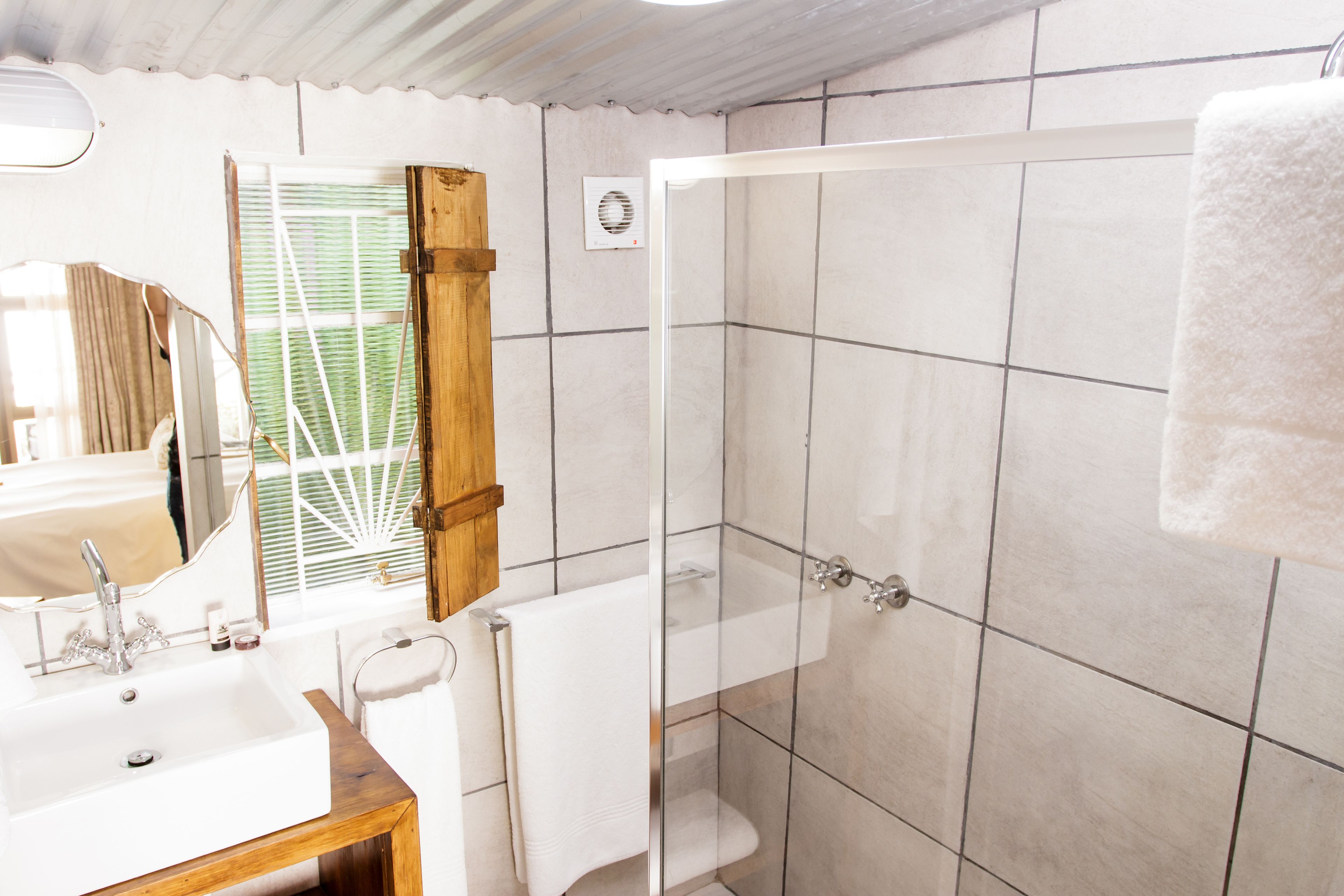 barn room | bathroom | separate bathtub and shower, hair dryer, towels, soap