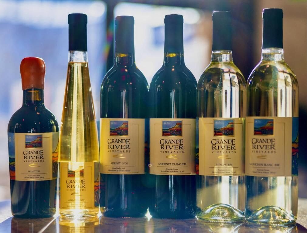 A row of wine bottles from Grande River Vineyards.