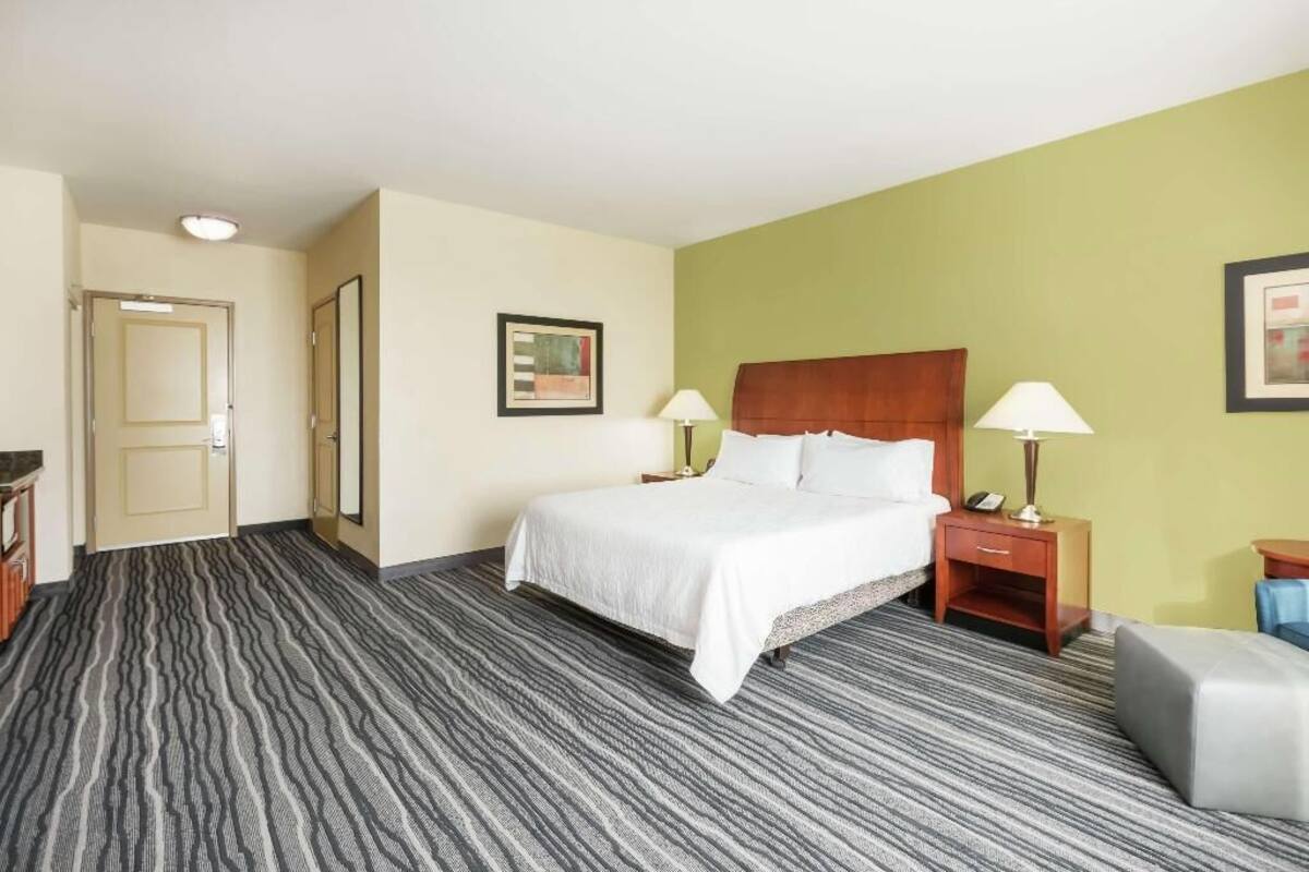Down duvets, pillow-top beds, in-room safe, desk