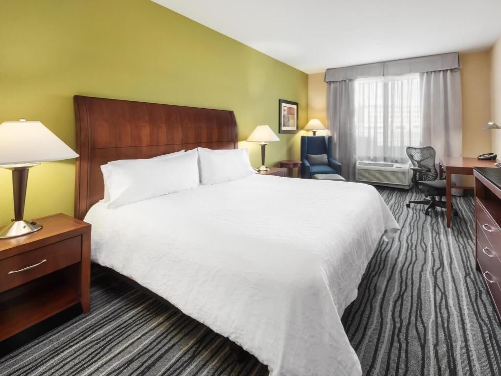 Down comforters, pillowtop beds, in-room safe, desk