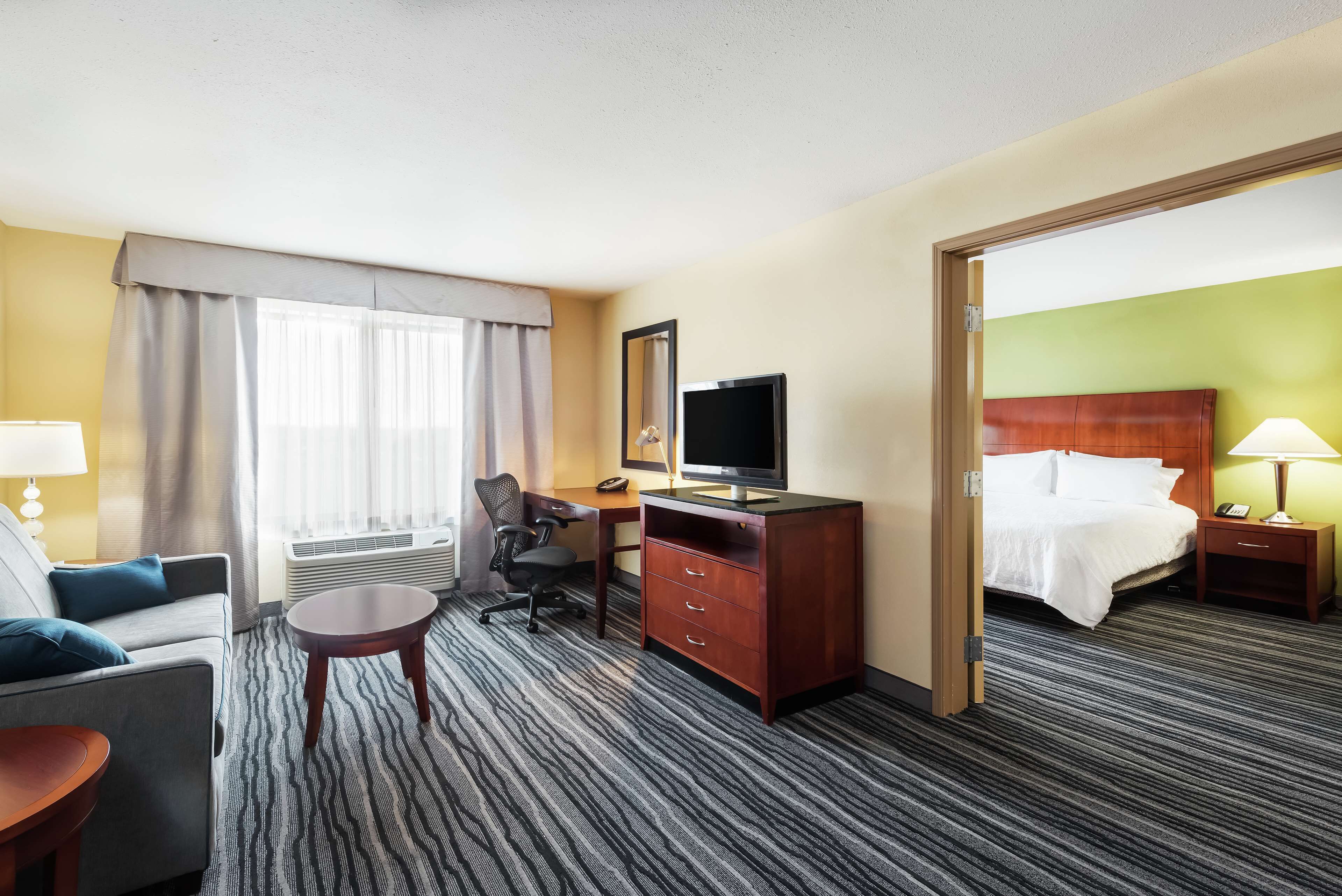 down duvets, pillow-top beds, in-room safe, desk